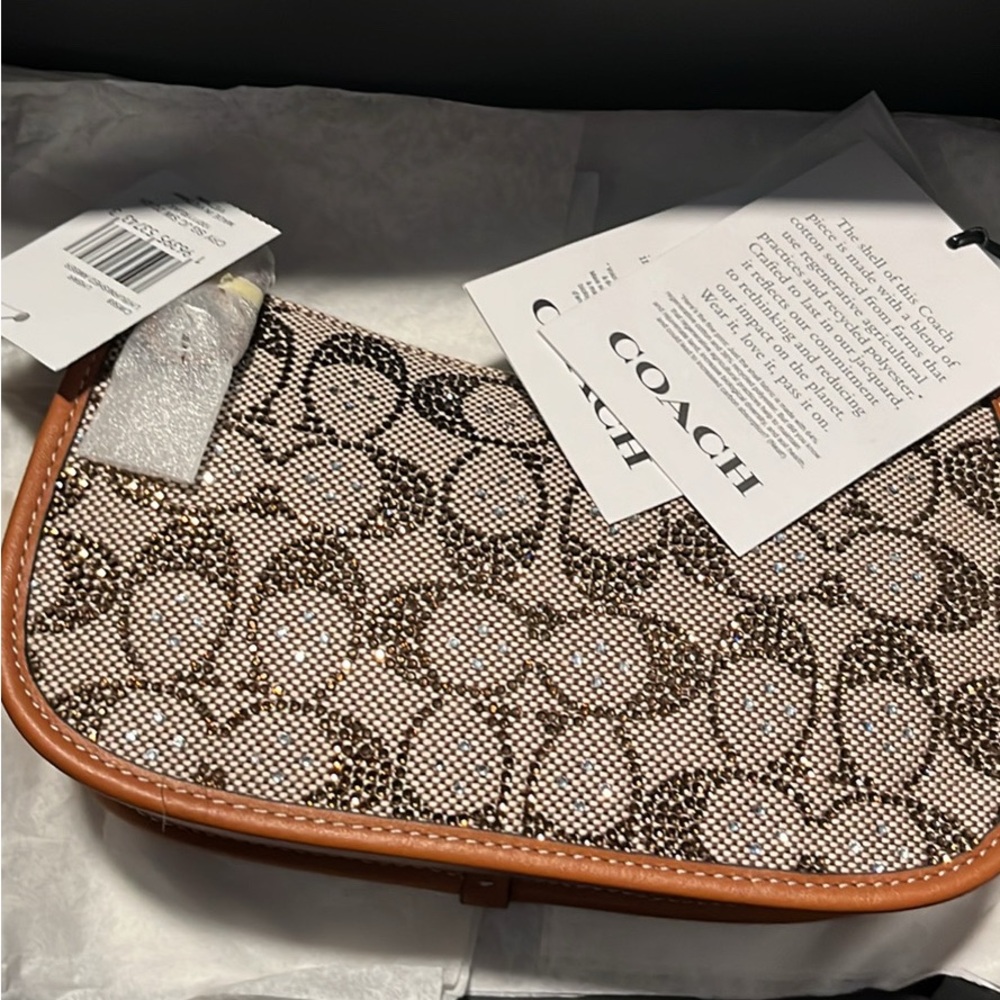 Coach Brown and Tan Clutch with Signature Pattern